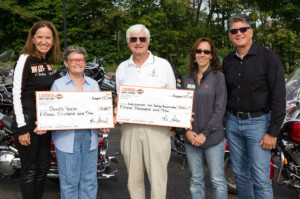  left to right, Anne Deli, Owner of Laconia Harley-Davidson, Nancy Whitman, Vice President of David’s House, Bob Knowles, of the Lake Winnipesaukee Sailing Association, Jaye Olmstead, Development Director at David’s House, and Ed Compton, General Manager of Laconia Harley-Davidson.